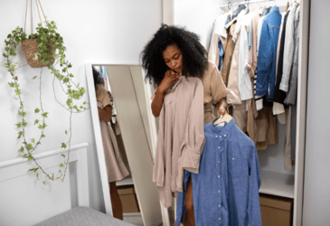 Neatly arranged minimalist wardrobe with curated clothing pieces